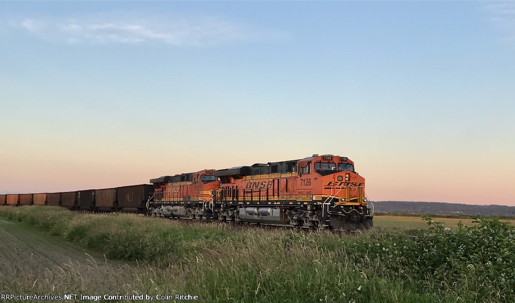 Trailing DPUs BNSF 7126/7712 E/B through the 104th Street"crossing on an empty coal train from Robert's Bank.